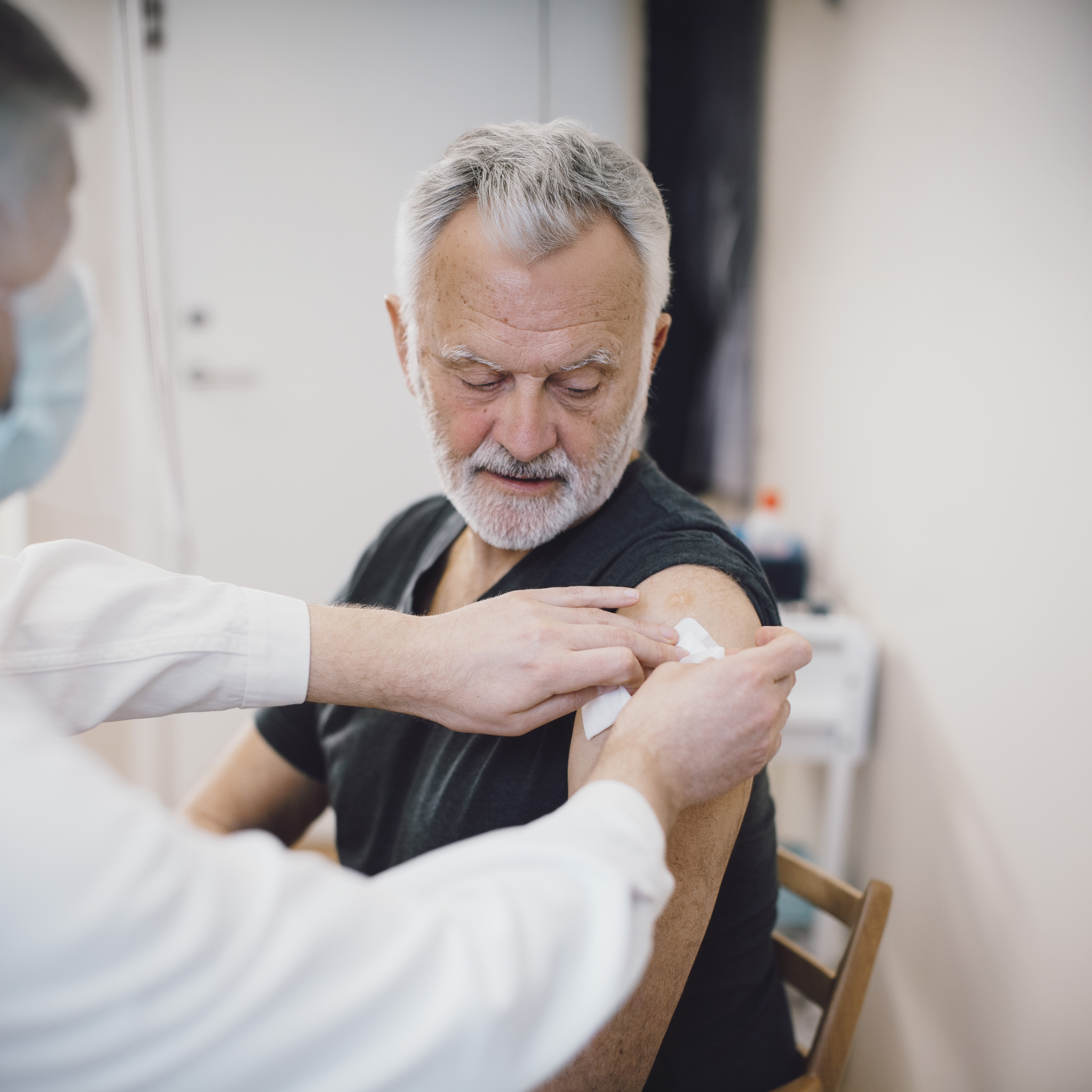 Doctor giving child a flu shot