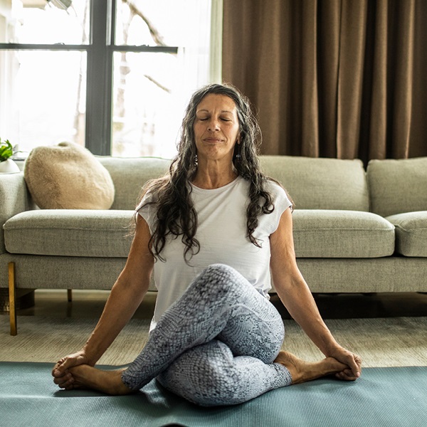 Woman Relaxed doing Yoga